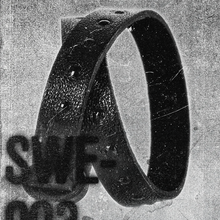 SWE-003 / Embossed Leather Cross Wrap Bracelet